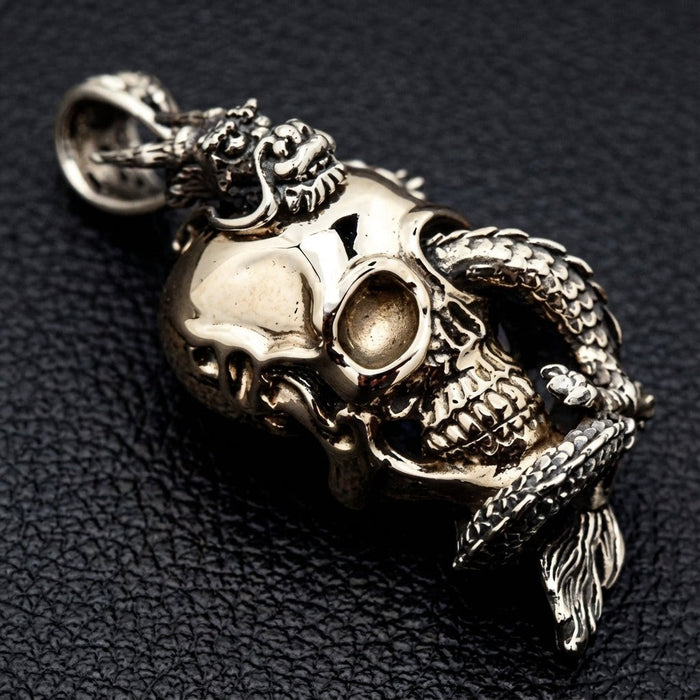 Closeup of handcrafted 925 sterling silver dragon skull pendant with detailed scales