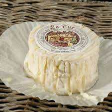 LA TUR Alta Langa Italian soft-ripened cheese on wicker surface