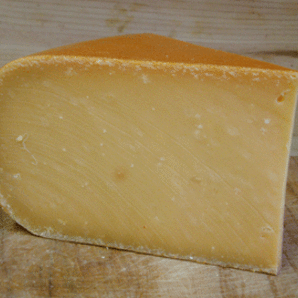 L'AMUSE GOUDA wedge standing on its side