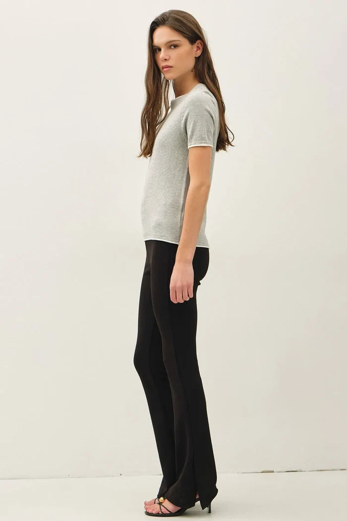 A light gray essential short sleeve sweater top with a subtle textured pattern in a layered look design