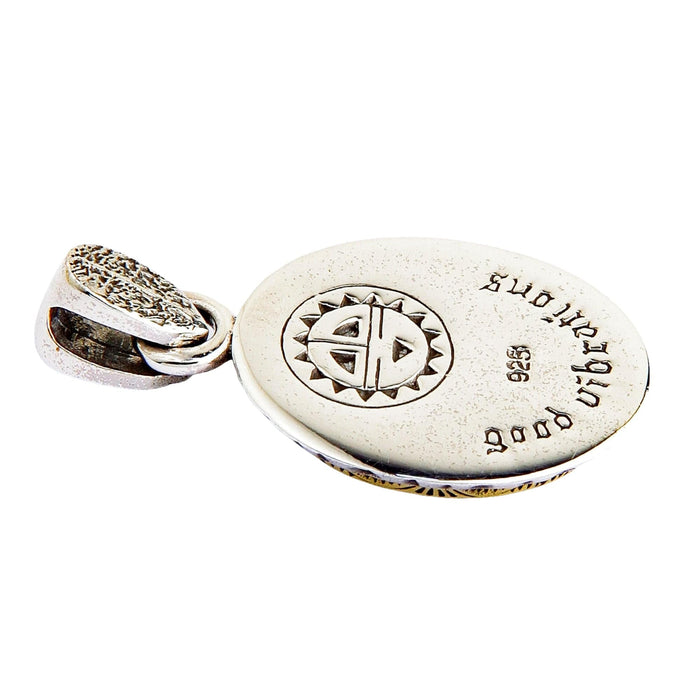 Detail of the "good vibrations" engraving and .925 stamp on the back of the Kokopelli pendant.