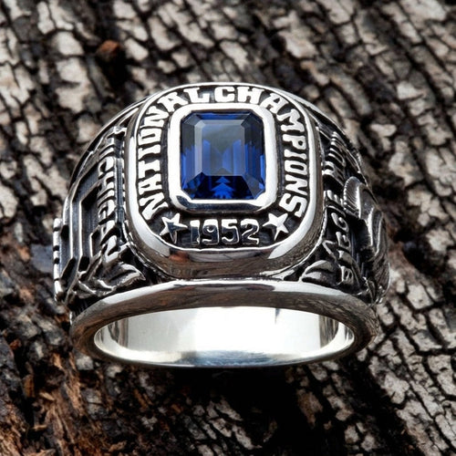 Close-up of the vibrant blue gemstone surrounded by National Champions text