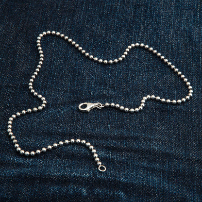 The men's 3mm silver ball necklace showing the full length.