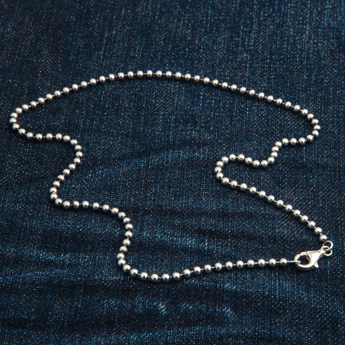 A full view of the durable silver ball chain for pendants.