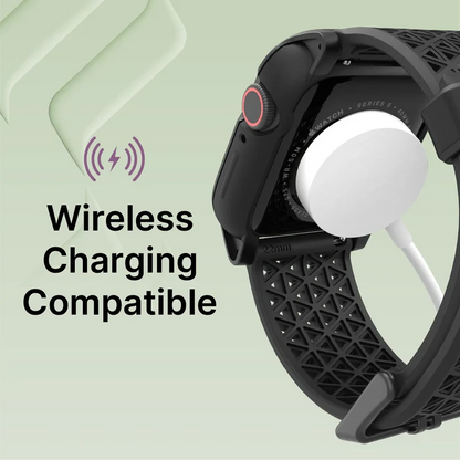The Catalyst Case US 40mm Rugged Case + Band for Apple Watch Series 6/5/4/SE is shown in black, charging wirelessly via a magnetic charger. ÃƒÂ¢Ã¢â€šÂ¬Ã…â€œWireless Charging Compatible, SureÃƒÂ¢Ã¢â€šÂ¬Ã‚Â and a purple wireless icon appear on a light green geometric background.