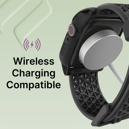 A Catalyst Case US 41mm - Rugged Case + Band for Apple Watch Series 9/8/7 in black is wirelessly charged on a magnetic charger. The light green background with abstract shapes features ÃƒÂ¢Ã¢â€šÂ¬Ã…â€œWireless Charging Compatible smartwatchÃƒÂ¢Ã¢â€šÂ¬Ã‚Â text and a purple icon.