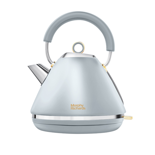 A Morphy Richards Accents Gold Pyramid Kettle in ocean grey with classy gold accents and a pyramid silhouette.