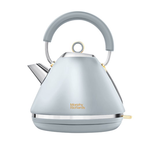 A Morphy Richards Accents Gold Pyramid Kettle in ocean grey with classy gold accents and a pyramid silhouette.