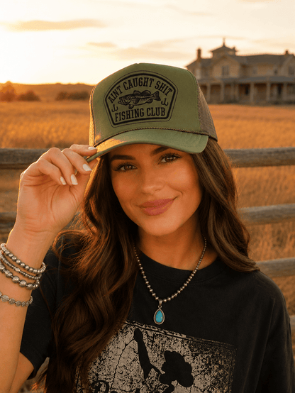 Aint Caught Shit Fishing Club Trucker HatOlive