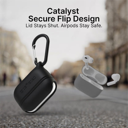 A Catalyst Case US AirPods Pro (Gen 3/2/1) Waterproof Case + Carabiner, in black, is sharply focused on a city street. Beside it, a blurred gray case spills AirPods. Text: “Secure Flip Design. Lid Stays Shut. AirPods Stay Safe.”.