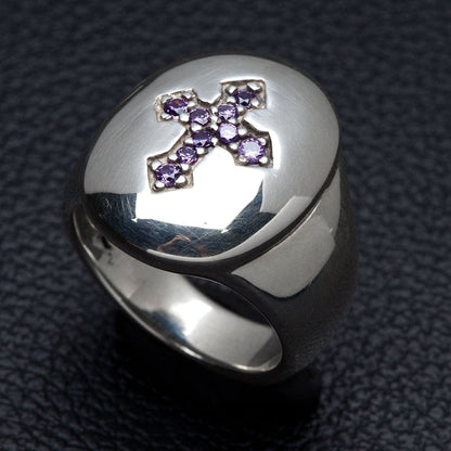 Angled view showing the high-polish mirror finish of the silver and the faceted purple stones.