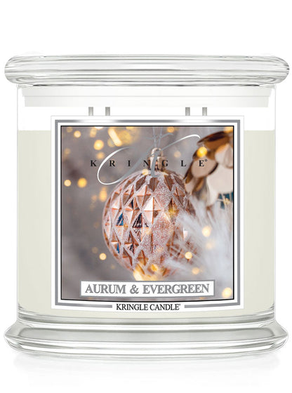 Kringle Candle with 'Aurum & Evergreen' scented 4-wick candle with ornaments label