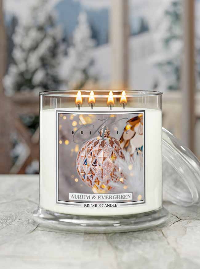 Kringle Candle with 'Aurum & Evergreen' scented 4-wick candle with ornaments label