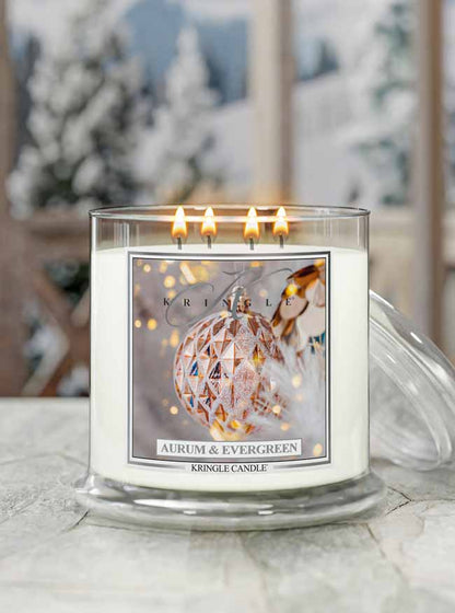 Kringle Candle with 'Aurum & Evergreen' scented 4-wick candle with ornaments label