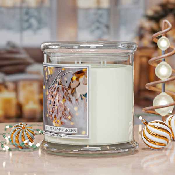 Aurum & Evergreen White 4-wick scented candle in a glass jar with decorative ornaments and lights ion label