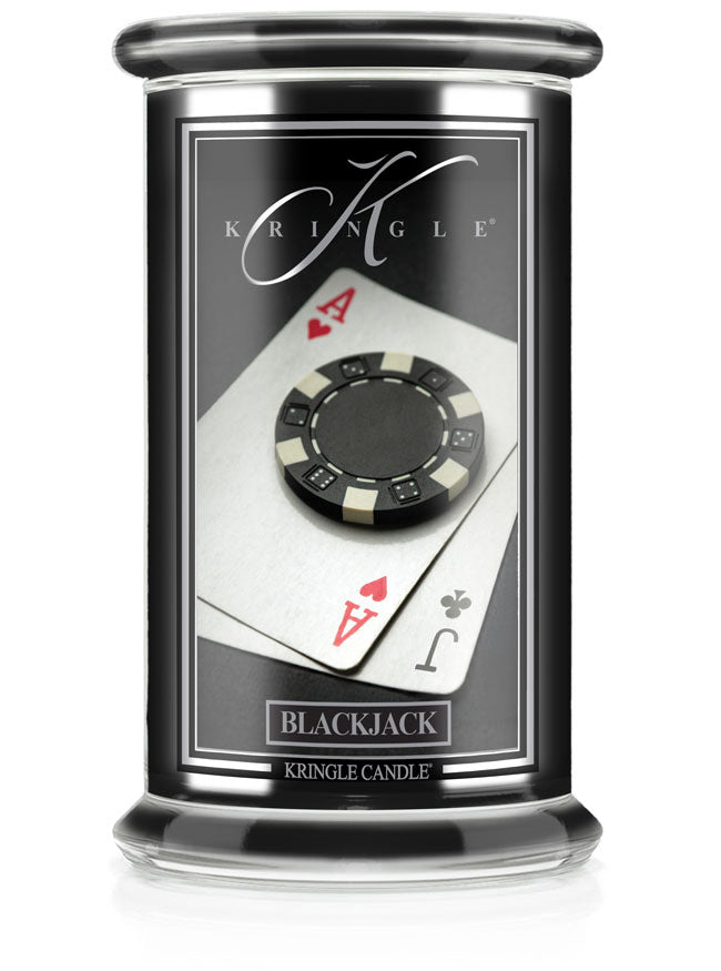 Jar candle of "Black Jack" unlit. Label shows a poker chip on ace of hearts and jack of clubs cards.