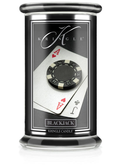 Jar candle of "Black Jack" unlit. Label shows a poker chip on ace of hearts and jack of clubs cards.