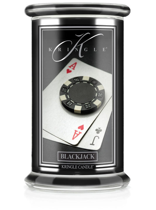 Jar candle of "Black Jack" unlit. Label shows a poker chip on ace of hearts and jack of clubs cards.