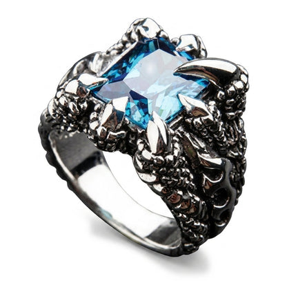 Left-side angle of the tribal flame relief carved down the oxidized sterling silver shank