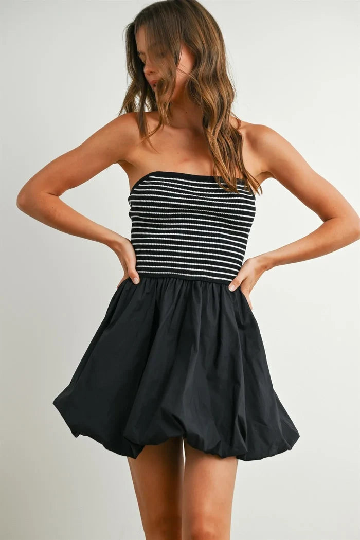 Black and white striped strapless bubble hem mini dress with gathered waistline