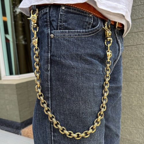 A man wearing the 24-inch brass biker wallet chain on his jeans.