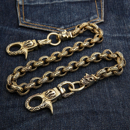 A 24-inch solid brass biker wallet chain with bulldog head connectors and flame clasps.
