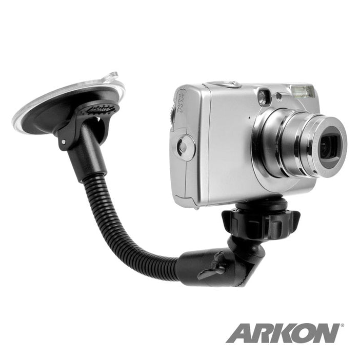 A silver digital camera is mounted to the left on the Camera Windshield Suction Car Mount with 8.5 Inch Gooseneck. The ARKON logo appears in the bottom right corner.