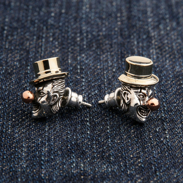 Unisex sterling silver clown earrings with copper accents