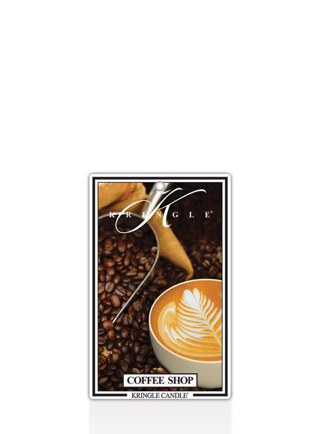 Kringle Candle Coffee Shop candle packaging with coffee beans and a cup of coffee on a white background