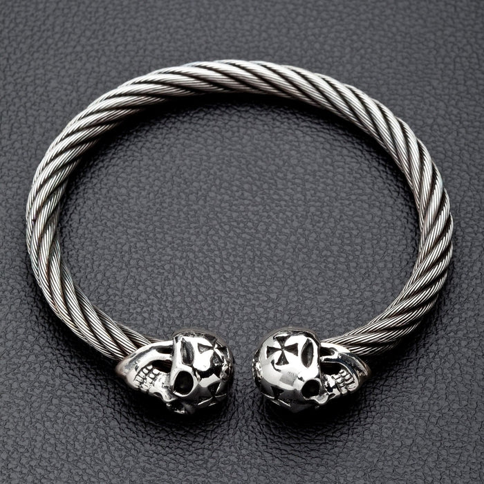 The full biker skull cuff bracelet in solid 925 silver and twisted stainless steel, on a black background.