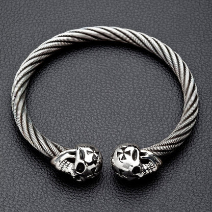 The full biker skull cuff bracelet in solid 925 silver and twisted stainless steel, on a black background.