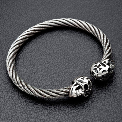 Top-down view of the cross skull cuff bracelet showing the adjustable opening.