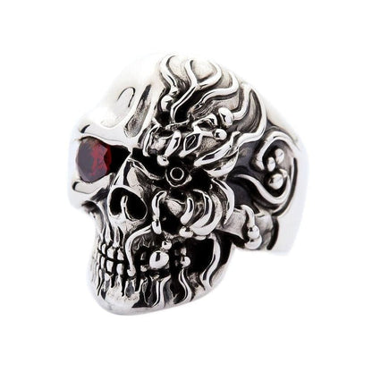 Side angle view of cyborg skull ring showing intricate mechanical plating and ruby eye on white background