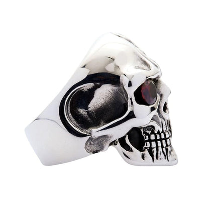 Detailed view of mechanical side of cyborg skull ring showing futuristic plating and textured silver work
