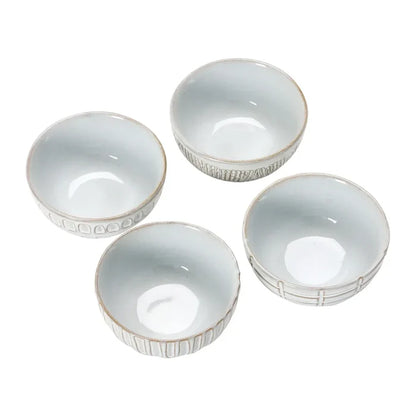 Set of four debossed stoneware soup bowls with textured white ceramic sides