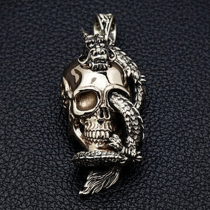Front view of 925 sterling silver dragon wrapping a brass skull pendant