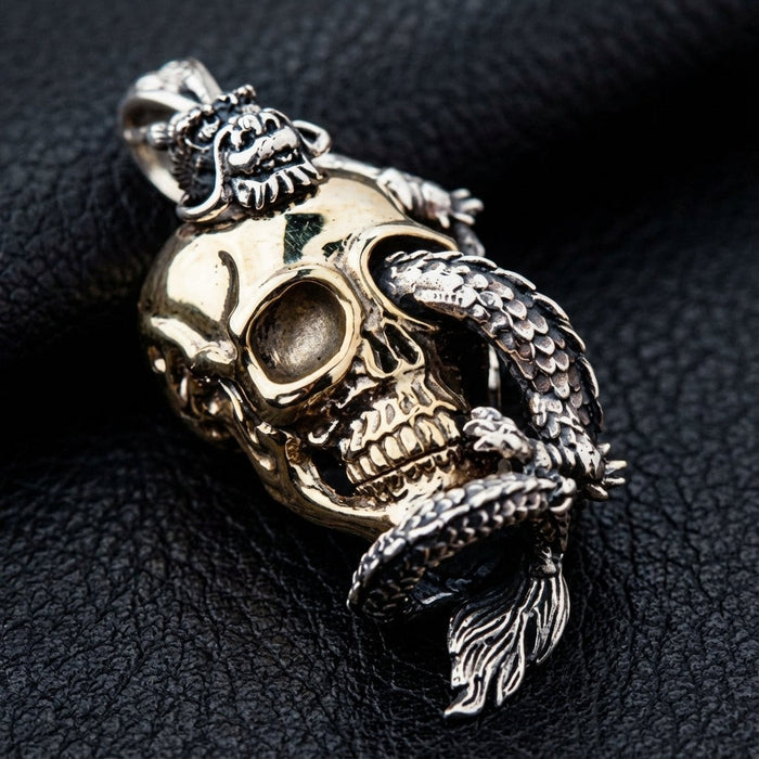 Close angled view of gothic skull pendant with dragon scales in sterling silver