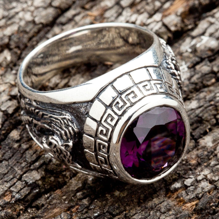 A heavy silver biker ring featuring the celestial rivals, the Dragon and the Tiger.