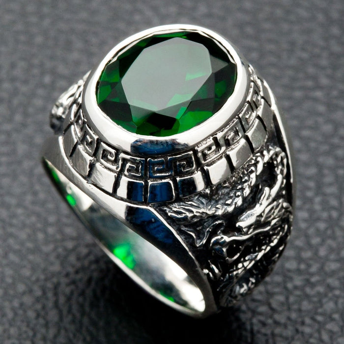 A piece of Japanese mythology jewelry for men, this ring symbolizes the balance of the dragon and tiger with a green stone.