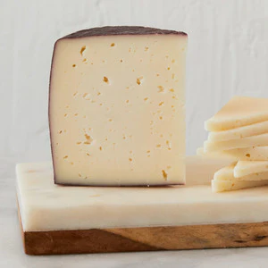 DRUNKEN GOAT DOP cheese from Mitica, Spain, semi-soft past goat cheese.