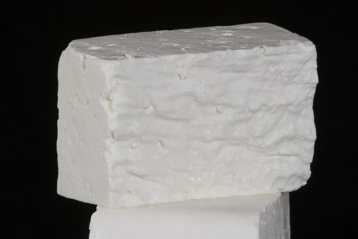 Feta cheese from Pure Luck Dairy, Dripping Springs, TX, crumbly texture.