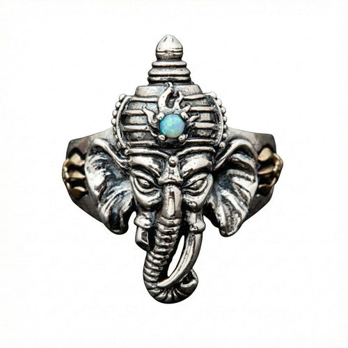 Front face view of the silver Ganesh ring featuring a genuine turquoise stone on the forehead.