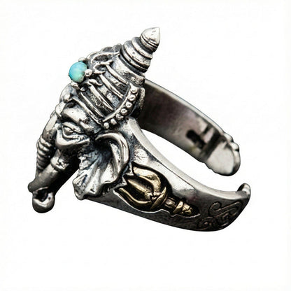 Side view of the adjustable silver ring highlighting the detailed trident symbol next to Ganesha.