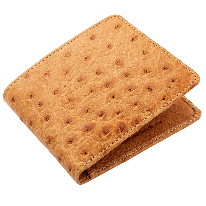 An angled view of the tan ostrich bifold wallet, closed, on a white background.