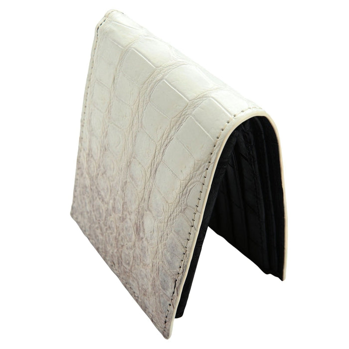 Close-up of handcrafted white crocodile wallet highlighting texture and stitching.