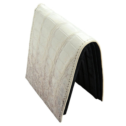 Close-up of handcrafted white crocodile wallet highlighting texture and stitching.