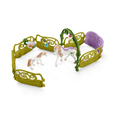 Glittering flower house with unicorns, lake and stable