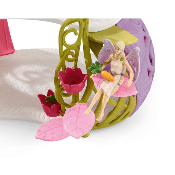 Glittering flower house with unicorns, lake and stable