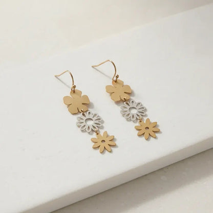 Gold and silver two-tiered floral dangle earrings with a sleek minimalist design for elegant wear
