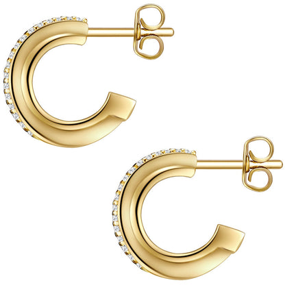 Goldene Creolen mit Zirkonia-Steinen